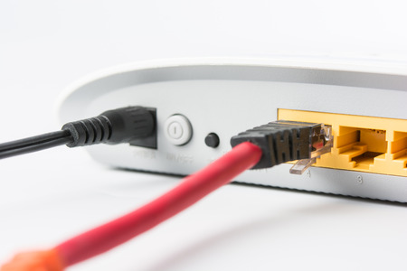 Wireless modem router network hub on white backgroundの写真素材