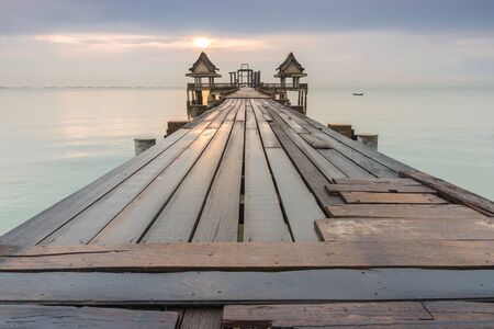 long bridge over the sea with sunrise of Thailandの写真素材
