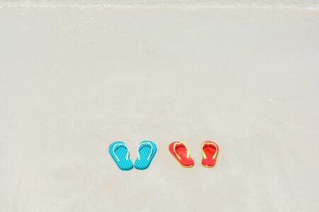 Beach, slippers on tropical beach in holiday at Thailandの写真素材