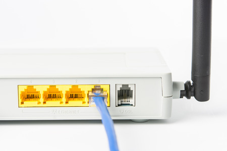Wireless modem router network hub on white backgroundの写真素材