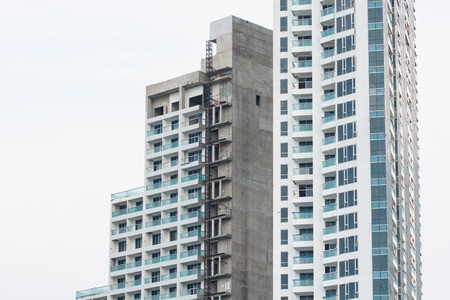 Apartment or condominium building construction site workの写真素材