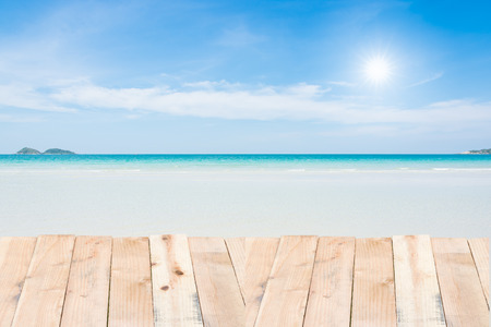 Beauty holiday wood terrace on beach blue skyの写真素材