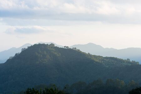 Sunset in the mountains at Doi Ang Khang of Thailandの写真素材