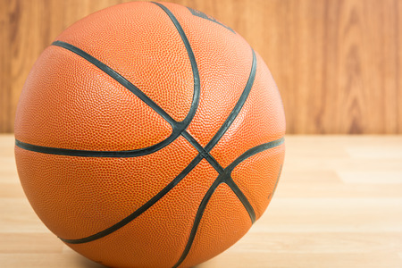 Close up Basketball on wooden floor backgroundの写真素材