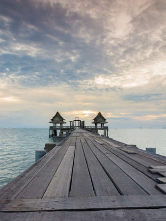 Twilight wood bridge at Djittabhawan Temple tourist attraction at Pattaya of Thailandの写真素材