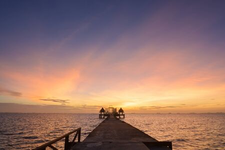 Twilight wood bridge at Djittabhawan Temple tourist attraction at Pattaya of Thailandの写真素材
