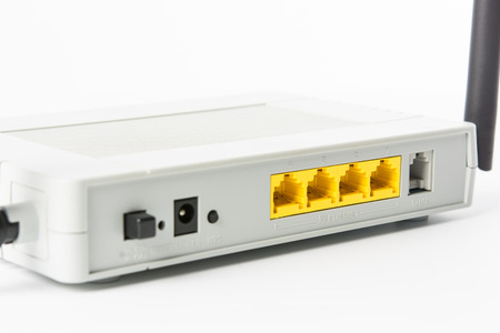 Wireless modem router network hub on white backgroundの写真素材