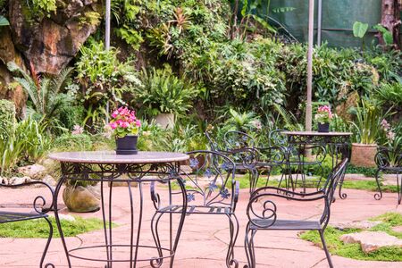 Garden Table and Chairs in the gardenの写真素材
