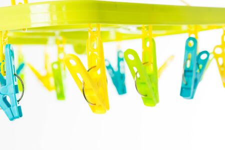 clothespin on clothesline isolate on over white backgroundの写真素材