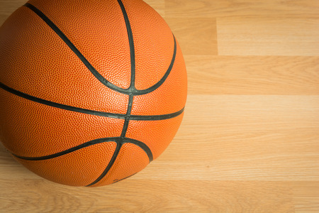 Close up Basketball on wooden floor backgroundの写真素材
