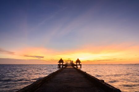 Twilight wood bridge at Djittabhawan Temple tourist attraction at Pattaya of Thailandの写真素材