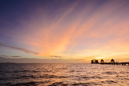 Twilight wood bridge at Djittabhawan Temple tourist attraction at Pattaya of Thailandの写真素材