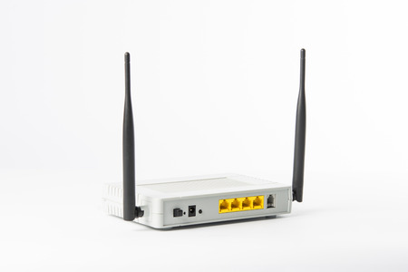 Wireless modem router network hub on white backgroundの写真素材