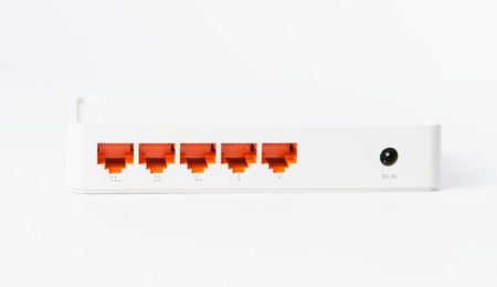 Wireless modem router network hub on white backgroundの写真素材