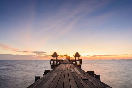 Twilight wood bridge at Djittabhawan Temple tourist attraction at Pattaya of Thailandの写真素材