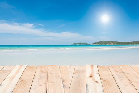 Beauty holiday wood terrace on beach blue skyの写真素材