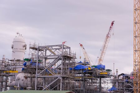 Industry crane and building construction site and blue skyのeditorial素材