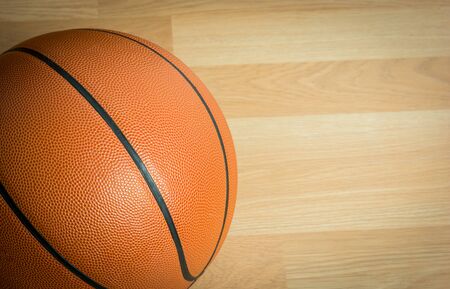 Close up Basketball on wooden floor backgroundの写真素材