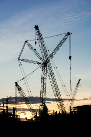 silhouette construction Industry oil rig refinery working site, asia in Thailandの写真素材