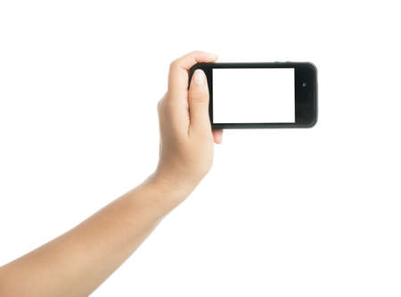 Woman hand holding black smart phone with blank screen, isolated on over white backgroundの写真素材