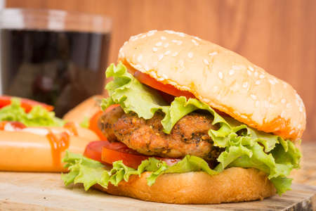 Classic Big hamburger on a wooden backgroundの写真素材