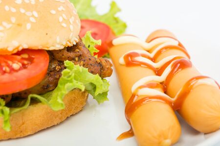 Classic Big hamburger on dish isolate on over white backgroundの写真素材