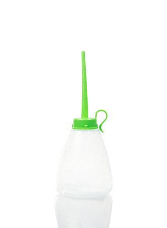 small plastic oiler can isolate on over white backgroundの写真素材
