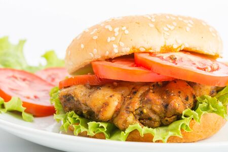 Classic Big hamburger on dish isolate on over white backgroundの写真素材