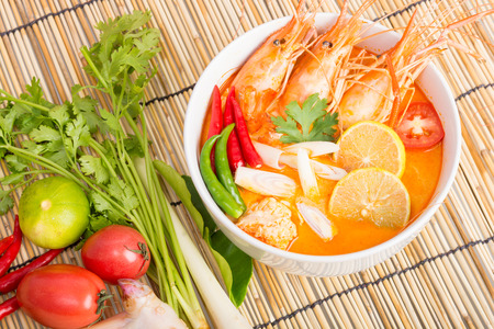 Tom Yum Goong, Thai hot spicy soup shrimp on wooden background, Thailand Foodの写真素材