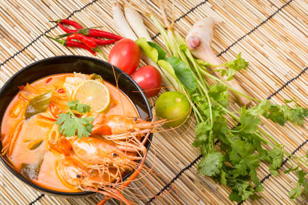 Tom Yum Goong, Thai hot spicy soup shrimp on wooden backgroundの写真素材