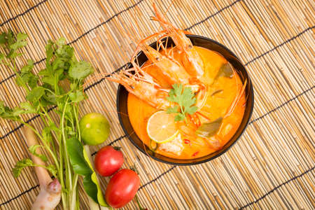 Tom Yum Goong, Thai hot spicy soup shrimp on wooden backgroundの写真素材