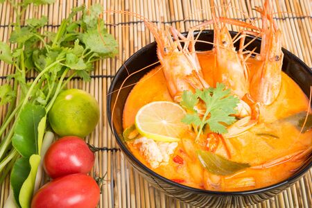 Tom Yum Goong, Thai hot spicy soup shrimp on wooden backgroundの写真素材