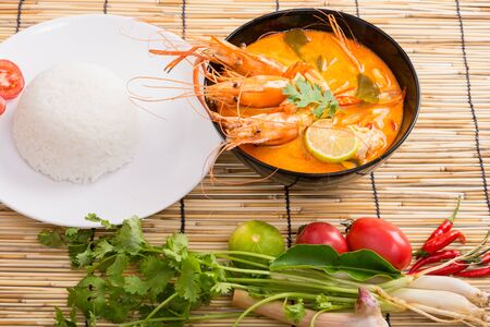 Tom Yum Goong, Thai hot spicy soup shrimp on wooden backgroundの写真素材