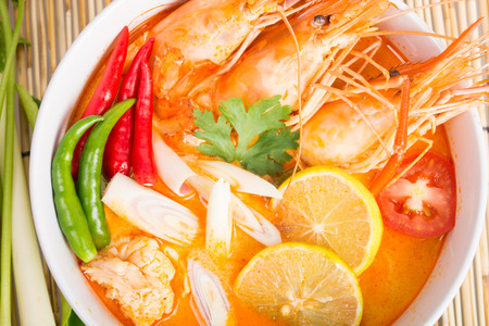 Tom Yum Goong, Thai hot spicy soup shrimp on wooden background, Thailand Foodの写真素材