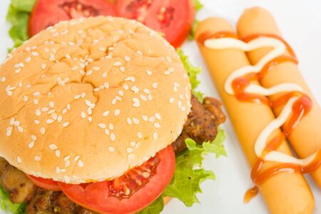 Classic Big hamburger on dish isolate on over white backgroundの写真素材