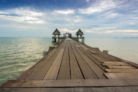 Twilight wood bridge at Djittabhawan Temple tourist attraction at Pattaya of Thailandの写真素材