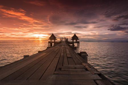 Twilight sunset wood bridge at Djittabhawan Temple tourist attraction in Pattaya, Thailandの写真素材