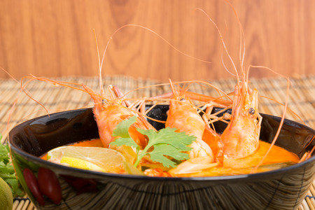 Tom Yum Goong, Thai hot spicy soup shrimp on wooden backgroundの写真素材