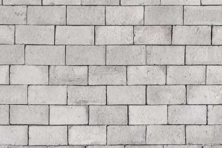 Background of big brick wall white texture backgroundの写真素材