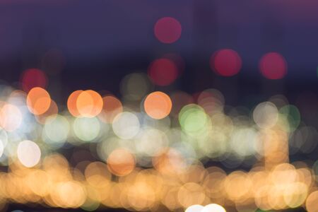 Abstract bokeh refinery or cityscape of night backgroundの写真素材