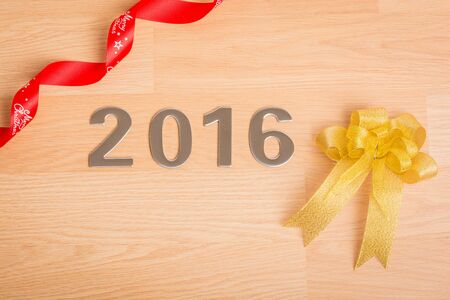 New year decoration, Closeup on 2016 on wooden backgroundの写真素材