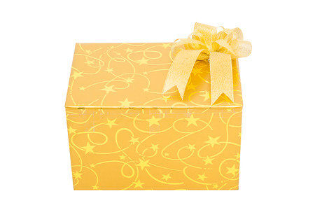 Gold gift box with bow isolate on over white backgroundの写真素材
