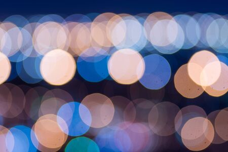 Abstract bokeh refinery or cityscape of night backgroundの写真素材
