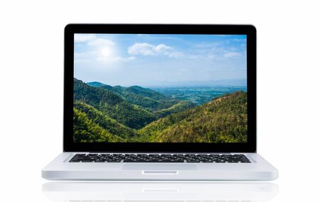 Laptop with landscape present monitor on over white backgroundの写真素材
