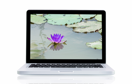 Laptop with landscape present monitor on over white backgroundの写真素材