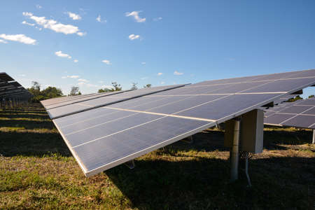 Photovoltaic solar energy panels for renewable electric production with blue sky