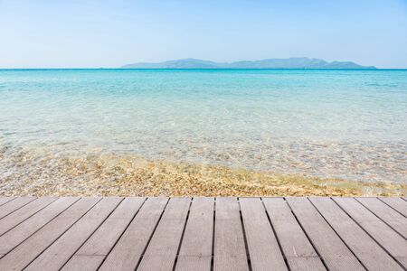 Beach Scene With Wooden Floor background can put or montage your productsの写真素材