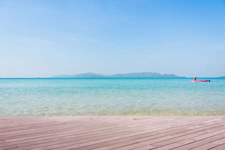 Beach Scene With Wooden Floor background can put or montage your productsの写真素材