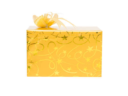 Gold gift box with bow isolate on over white backgroundの写真素材