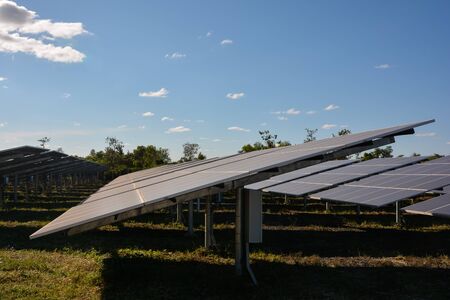 Photovoltaic solar energy panels and sunlight with blue skyの写真素材